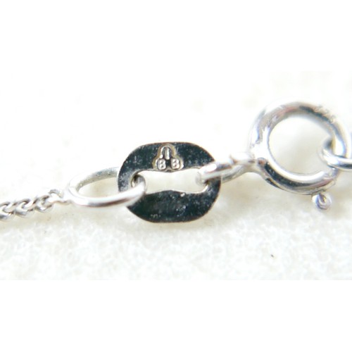 42 - A 9ct white gold diamond set crucifix on a fine 9ct chain 12 by 10 by 5mm, chain 46cm, 3.1g.