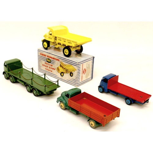 239 - Four vintage Dinky die-cast lorries comprising a chain sided Foden, Leyland Comet, flat bed Guy, and... 