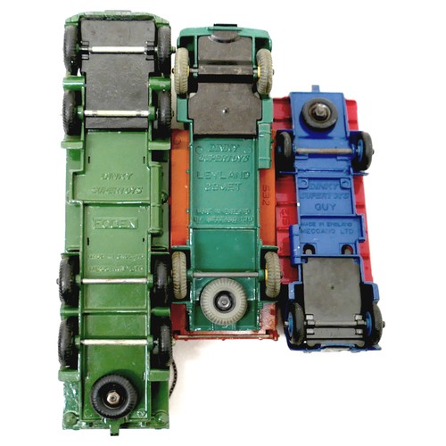 239 - Four vintage Dinky die-cast lorries comprising a chain sided Foden, Leyland Comet, flat bed Guy, and... 