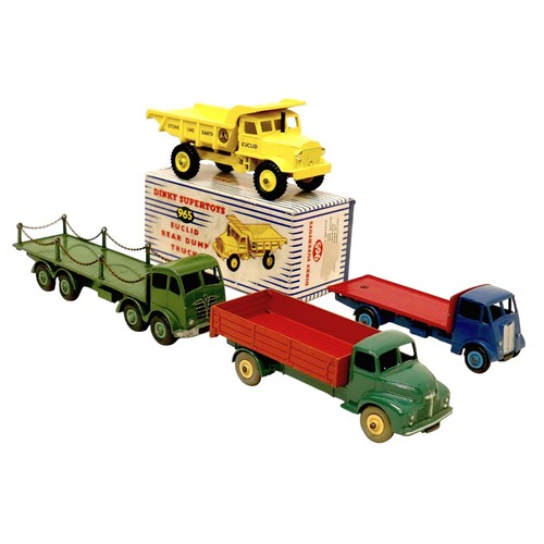 239 - Four vintage Dinky die-cast lorries comprising a chain sided Foden, Leyland Comet, flat bed Guy, and... 