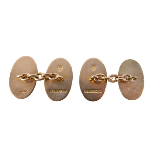 54 - A pair 9ct gold gentleman's cufflinks, of oval form decorated with textured stripe, 6.1g.
