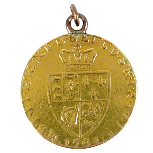 89 - A George III gold spade guinea, 1793, with ring attachment, 8.3g.