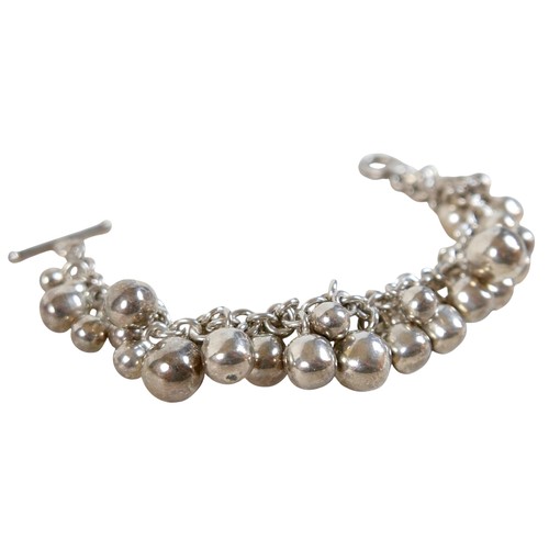 7 - A sterling 925 silver bracelet, with bauble design pendants, 19cm long, 2.92 toz.