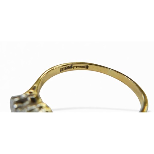 57 - An 18ct gold three stone diamond ring, all stones  approximately 3.5mm in diameter, size T, 2.7g.