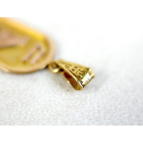 23 - An Egyptian 18ct gold cartouche pendant, 4cm long including loop, 2.2g.