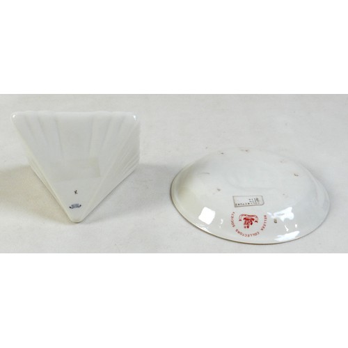 163 - A collection of seven Belleek pieces of pottery to include three shamrock vases and a shell designed... 