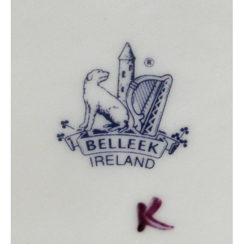 163 - A collection of seven Belleek pieces of pottery to include three shamrock vases and a shell designed... 