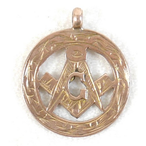 5 - A 9ct gold Masonic medallion, 2.3g,  together with a white metal pendant. (1 bag)