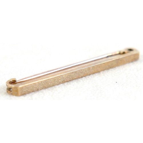 27 - Two 9ct gold tie-pins, 4.2g overall, together with a vintage 'John Grant Jeweller Bulawayo' box. (1 ... 
