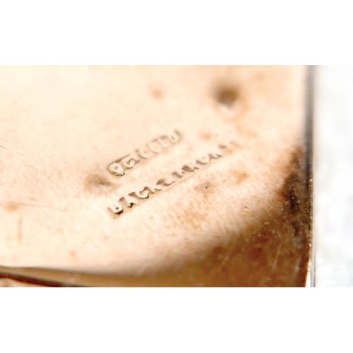 14 - A ruby-set gilt metal locket, 3cm square, marked '9ct gold back & front' and stamped 'silver setting... 