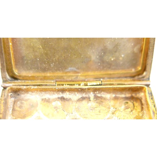 14 - A ruby-set gilt metal locket, 3cm square, marked '9ct gold back & front' and stamped 'silver setting... 