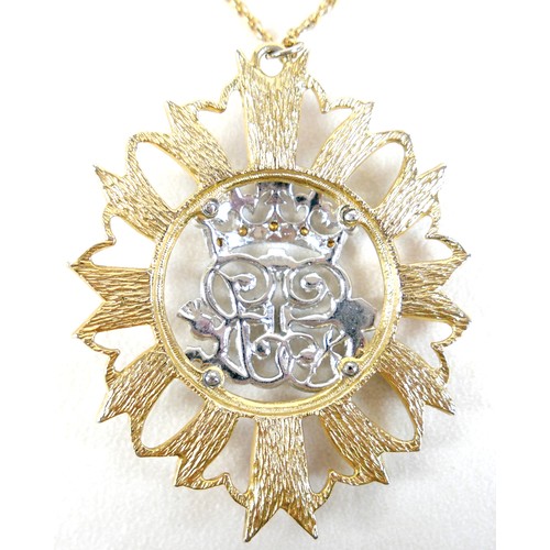 12 - An emerald cut loose ruby 8.92ct wit GIL laboratory card certificate, plus ER enamel pendant on chai... 