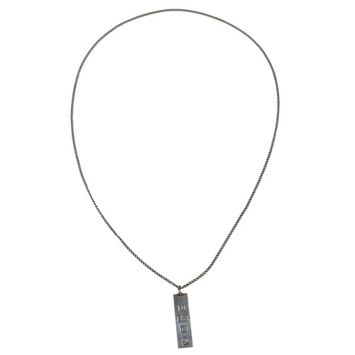 35 - A collection of silver jewellery including an ingot, rings and charms, total weight 7.4 troy oz.(1 b... 