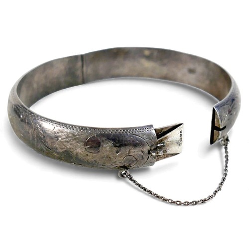 35 - A collection of silver jewellery including an ingot, rings and charms, total weight 7.4 troy oz.(1 b... 