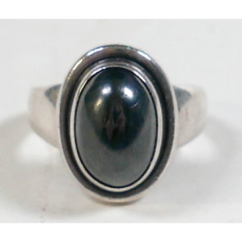 25 - Georg Jensen - a pair of stud earrings and a ring designed by Harald Nielsen; the circular stud earr... 