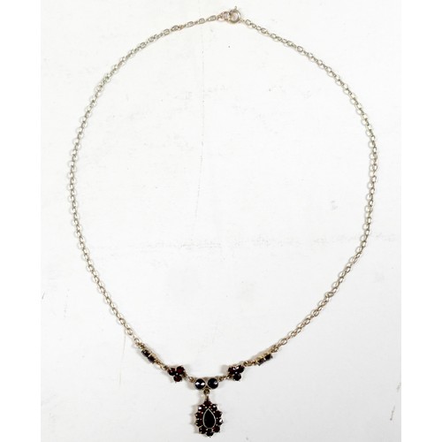 50 - A 9ct yellow gold garnet necklace and a pair of 9ct yellow gold screw back garnet earrings, necklace... 