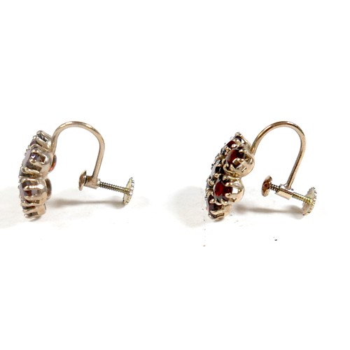 50 - A 9ct yellow gold garnet necklace and a pair of 9ct yellow gold screw back garnet earrings, necklace... 