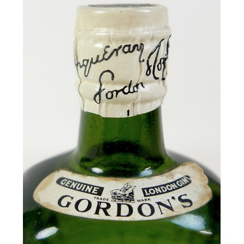 152 - A half bottle of Gordons Special Dry London Gin sprung capsule, 70° proof, circa 1950's bottling lev... 