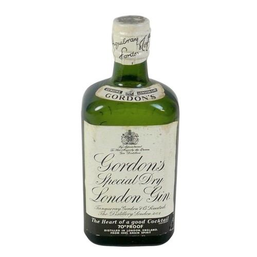 152 - A half bottle of Gordons Special Dry London Gin sprung capsule, 70° proof, circa 1950's bottling lev... 