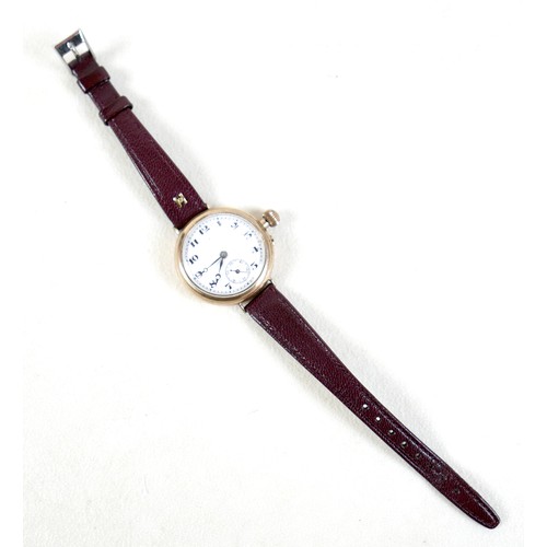 94 - A 9ct yellow gold pocket watch conversion wristwatch with 32mm case, white enamel dial arabic numera... 