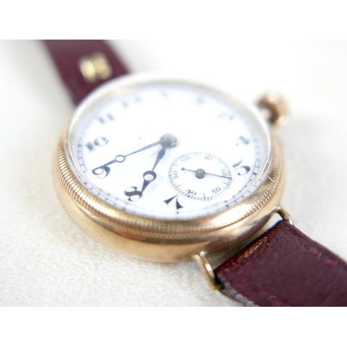 94 - A 9ct yellow gold pocket watch conversion wristwatch with 32mm case, white enamel dial arabic numera... 