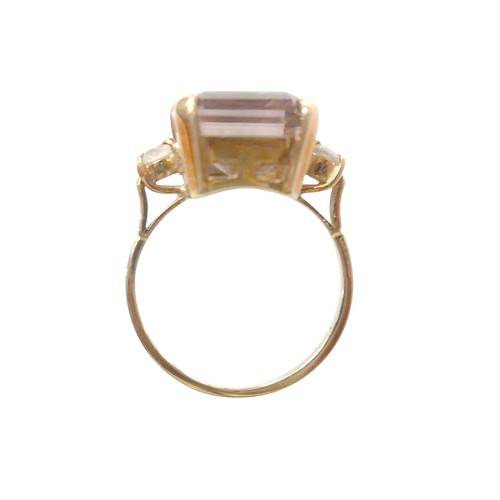 76 - An 18ct yellow gold bi-colour tourmaline and diamond ring the central stone approximately 6ct flanke... 