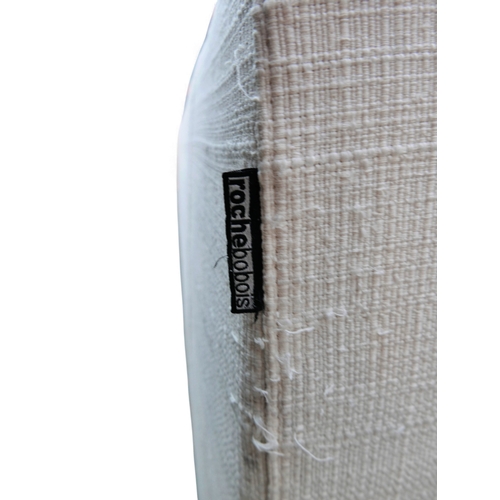 398 - A Roche Bobois long beach corner sofa, upholstered in white fabric, each section 104 by 225 by 57cm ... 