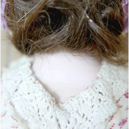 21 - Two 20th century bisque headed dolls, including a large doll with glass eyes and closed mouth 28 1/2... 