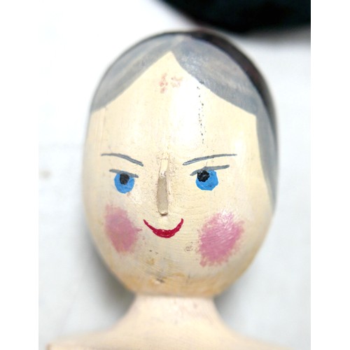 19 - Three early 20th century peg dolls, including two in traditional Welsh dress, tallest 32cm, as well ... 