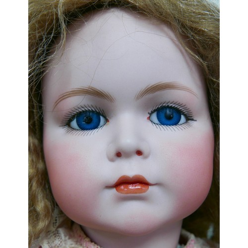 30 - A large early 20th century Kammer & Reinhardt bisque headed doll, with glass eyes, painted features ... 