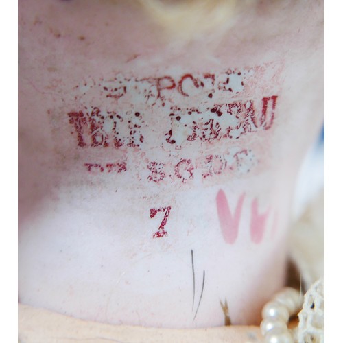 39 - A bisque headed Jumeau doll, with glass eyes, hand painted eye lashes, eye brows and lips, closed mo... 