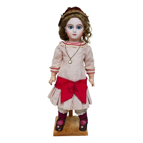 40 - A Bruno Schmidt bisque headed doll, with glass eyes, hand painted eyelashes, eyebrows and lips, clos... 