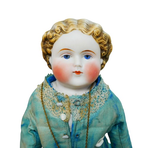 42 - A late 19th century/early 20th century bisque headed doll, with moulded hair, hand painted features,... 