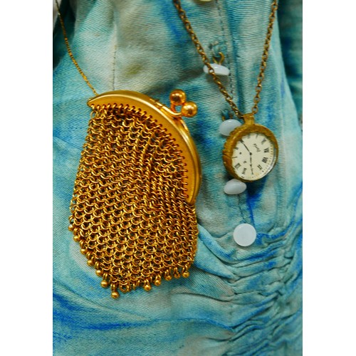 42 - A late 19th century/early 20th century bisque headed doll, with moulded hair, hand painted features,... 