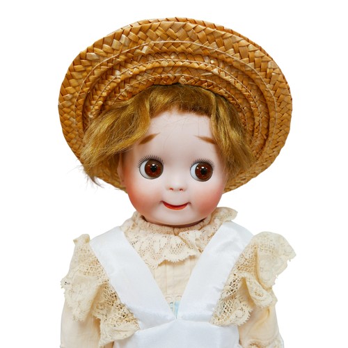 44 - An early 20th century J. D. Kestner style bisque headed doll, glass eyes, closed mouth, impressed ma... 
