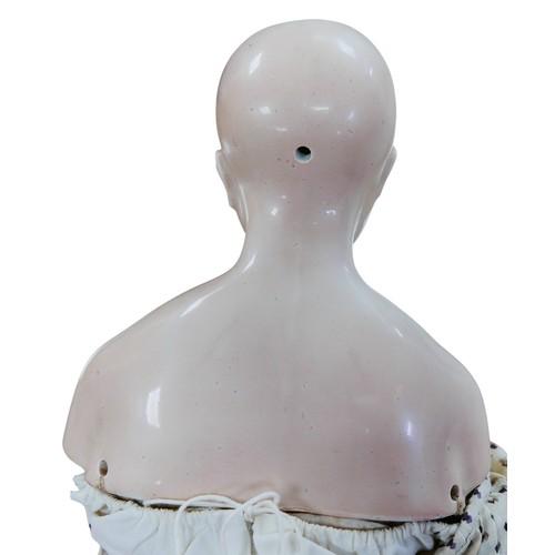 49 - A 19th century German porcelain headed doll, possibly by Lippert & Haas, with hand painted face, and... 