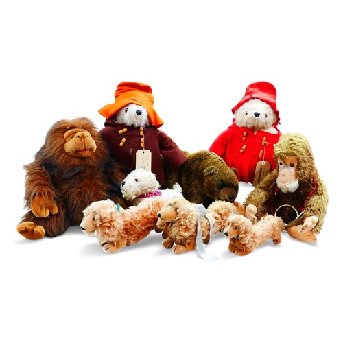 12 - Two Gabrielle Designs Paddington bears, the largest, with original name tag, 47cm high, the other wi... 