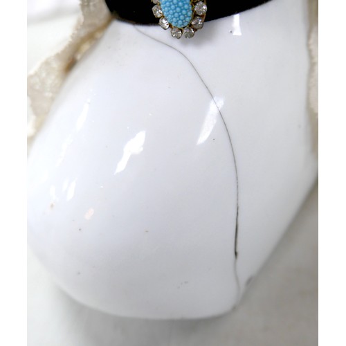 51 - Four 19th century bisque dolls' shoulder-heads, all with hand painted features and middle partings t... 