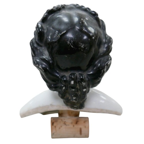 52 - Four 19th century bisque doll heads, comprising three 19th century bisque shoulder-head dolls, all w... 