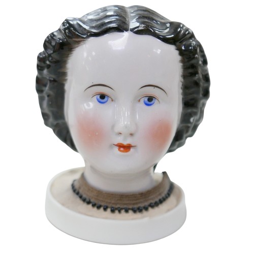 52 - Four 19th century bisque doll heads, comprising three 19th century bisque shoulder-head dolls, all w... 