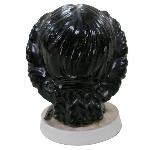 52 - Four 19th century bisque doll heads, comprising three 19th century bisque shoulder-head dolls, all w... 