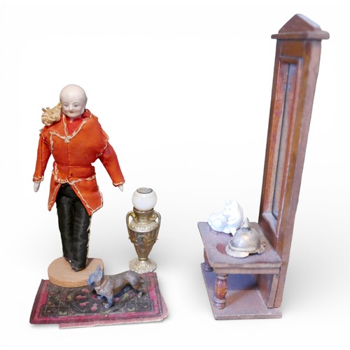 67 - A group of doll's house accessories, including three figures, a mangle, umbrella stand, and dogs. (1... 