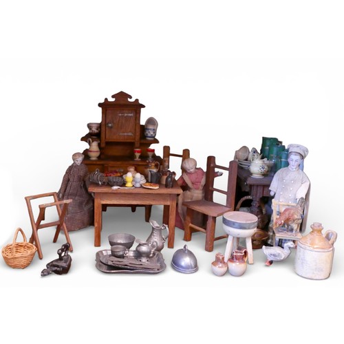 68 - A group of doll's house kitchen items, spice jars, pots and pans, die-cast lead chickens. (1 box)
Pr... 