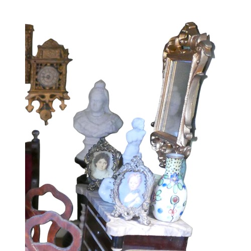 69 - A group of doll's house furniture and accessories, including a dining table with food, three figures... 