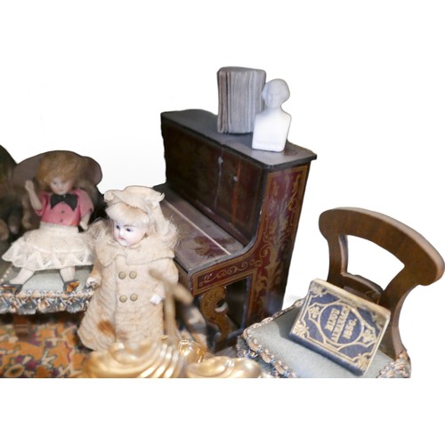 70 - Six dolls and assorted doll's house furnishings, including a piano, some Chinese blue and white cera... 