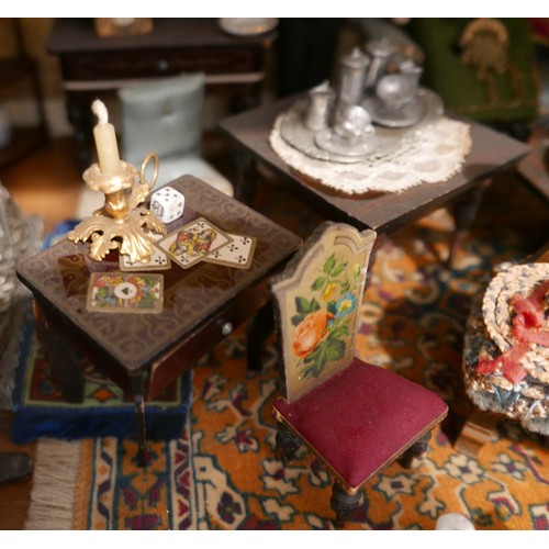 70 - Six dolls and assorted doll's house furnishings, including a piano, some Chinese blue and white cera... 