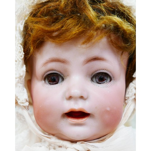 20 - Two late 19th/early 20th century bisque headed dolls, comprising a Simon & Halbig/Kammer & Reinhardt... 