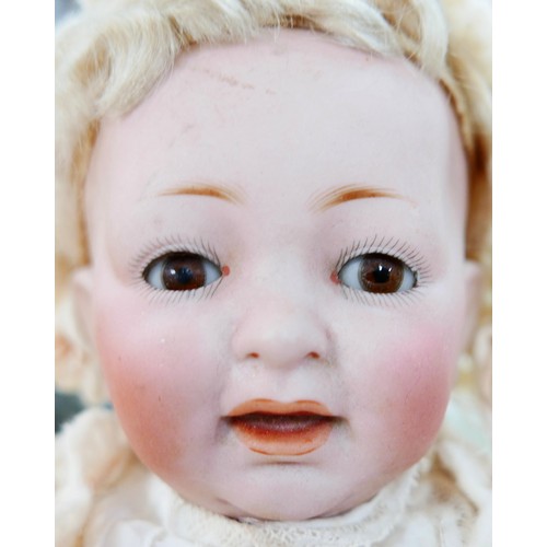 20 - Two late 19th/early 20th century bisque headed dolls, comprising a Simon & Halbig/Kammer & Reinhardt... 