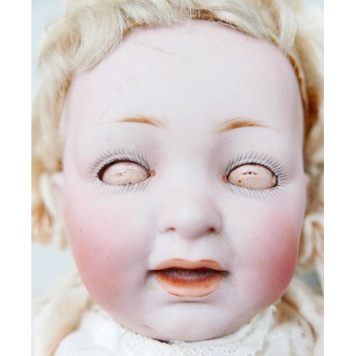20 - Two late 19th/early 20th century bisque headed dolls, comprising a Simon & Halbig/Kammer & Reinhardt... 