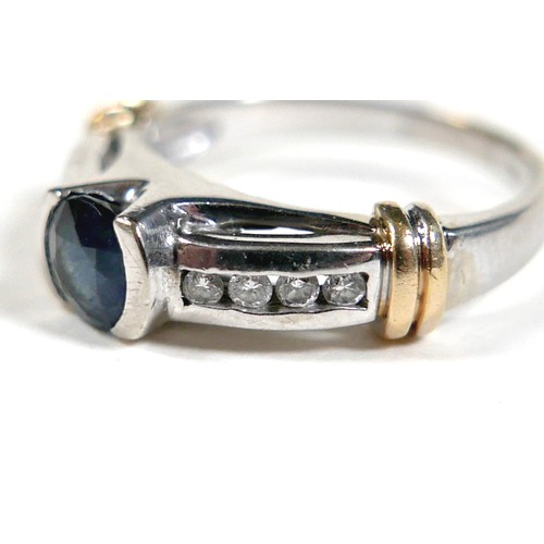 156 - An 18ct gold sapphire and diamond ring, the central round cut sapphire approximately 5mm diameter, w... 
